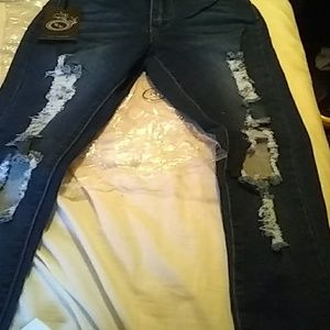 Denim blue distressed skinny jeans